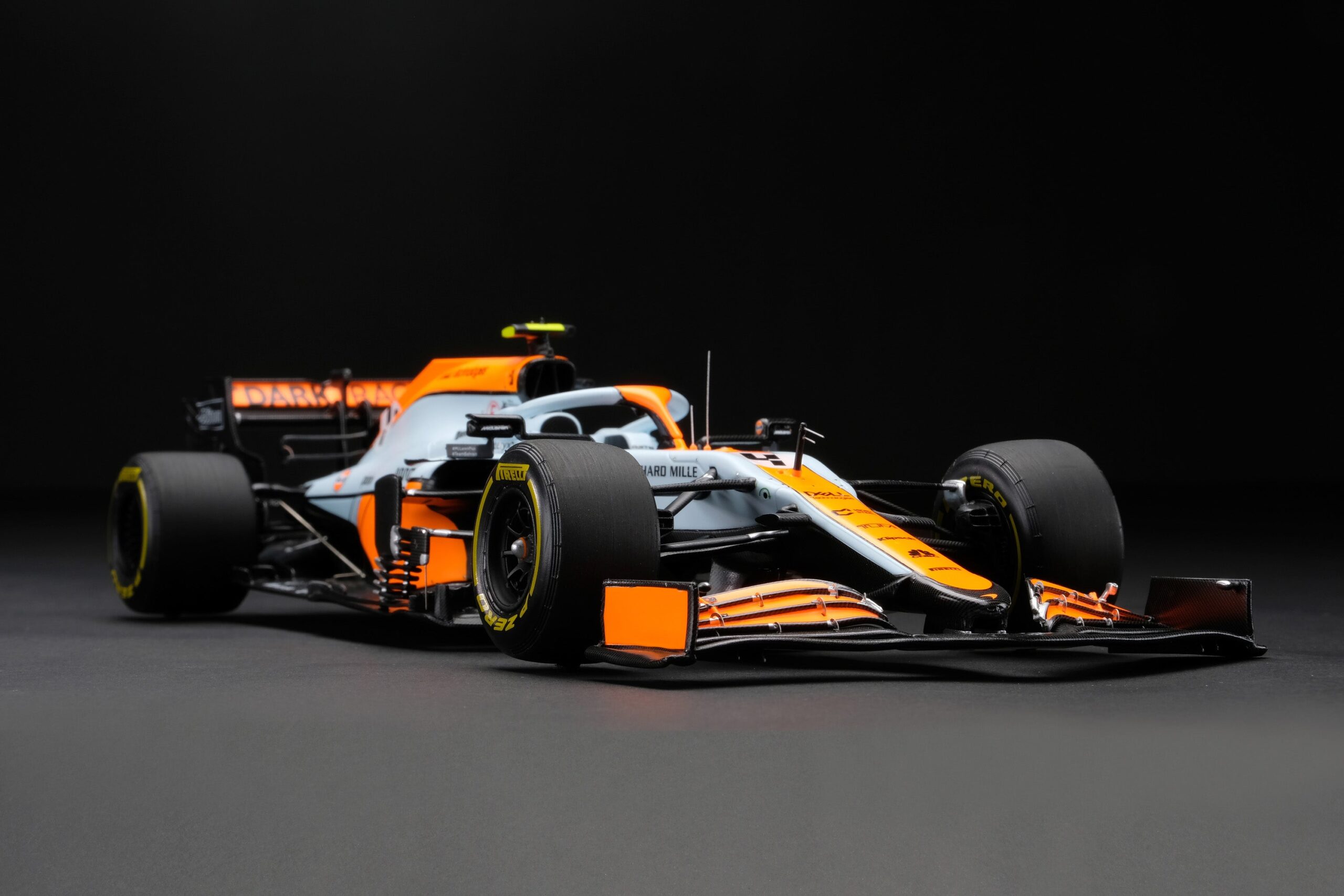 Amalgam McLaren MCL35M 2021 Gran Premio di Monaco - Celeste/Arancione | 1:18
