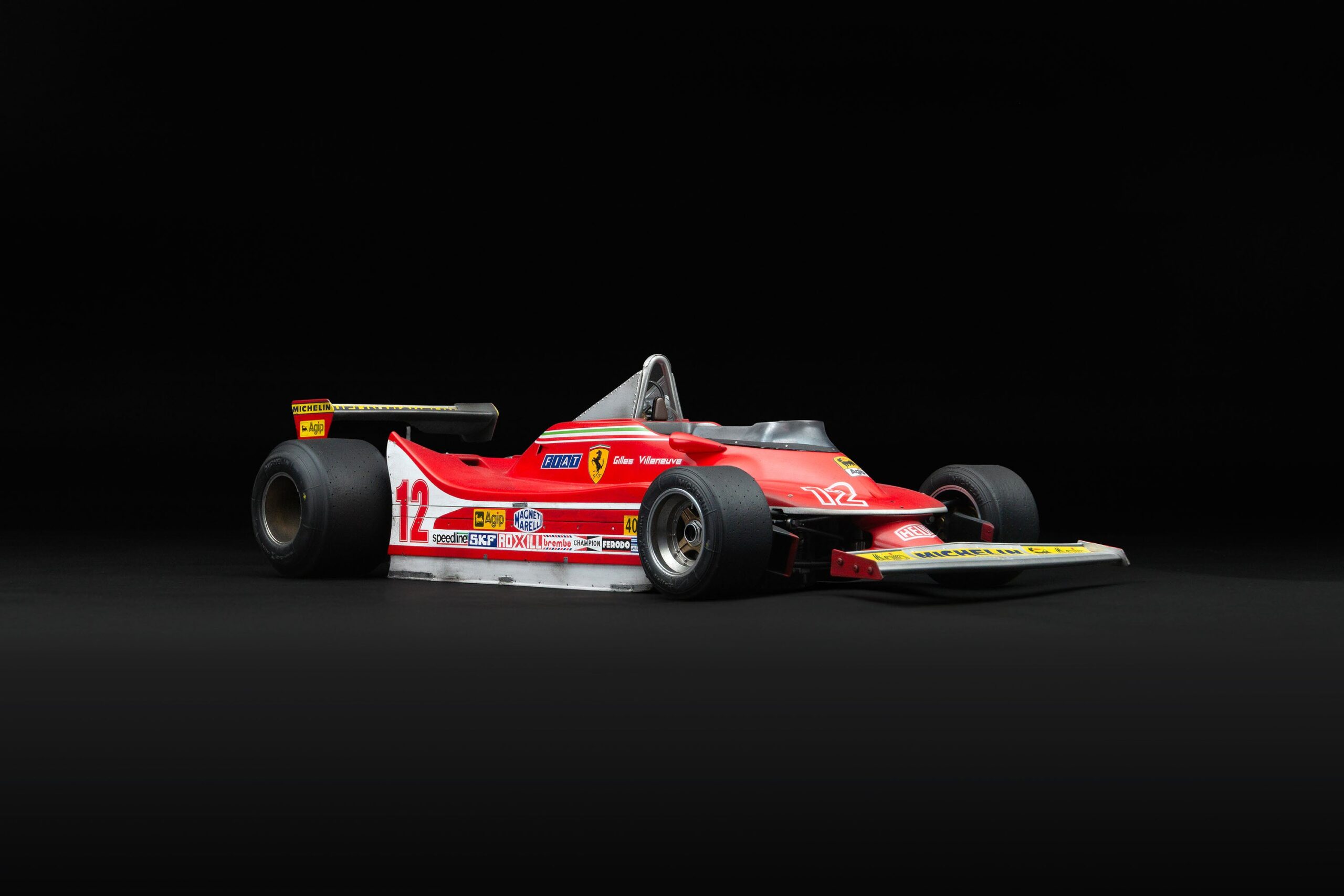 Amalgam Ferrari 312 T4 1979 US East Grand Prix Winner Gilles Villeneuve Race Weathered - Red | 1:8